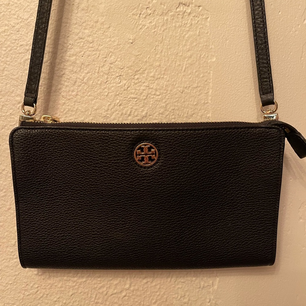 Tory Burch cross body a few years old but barley used great condition